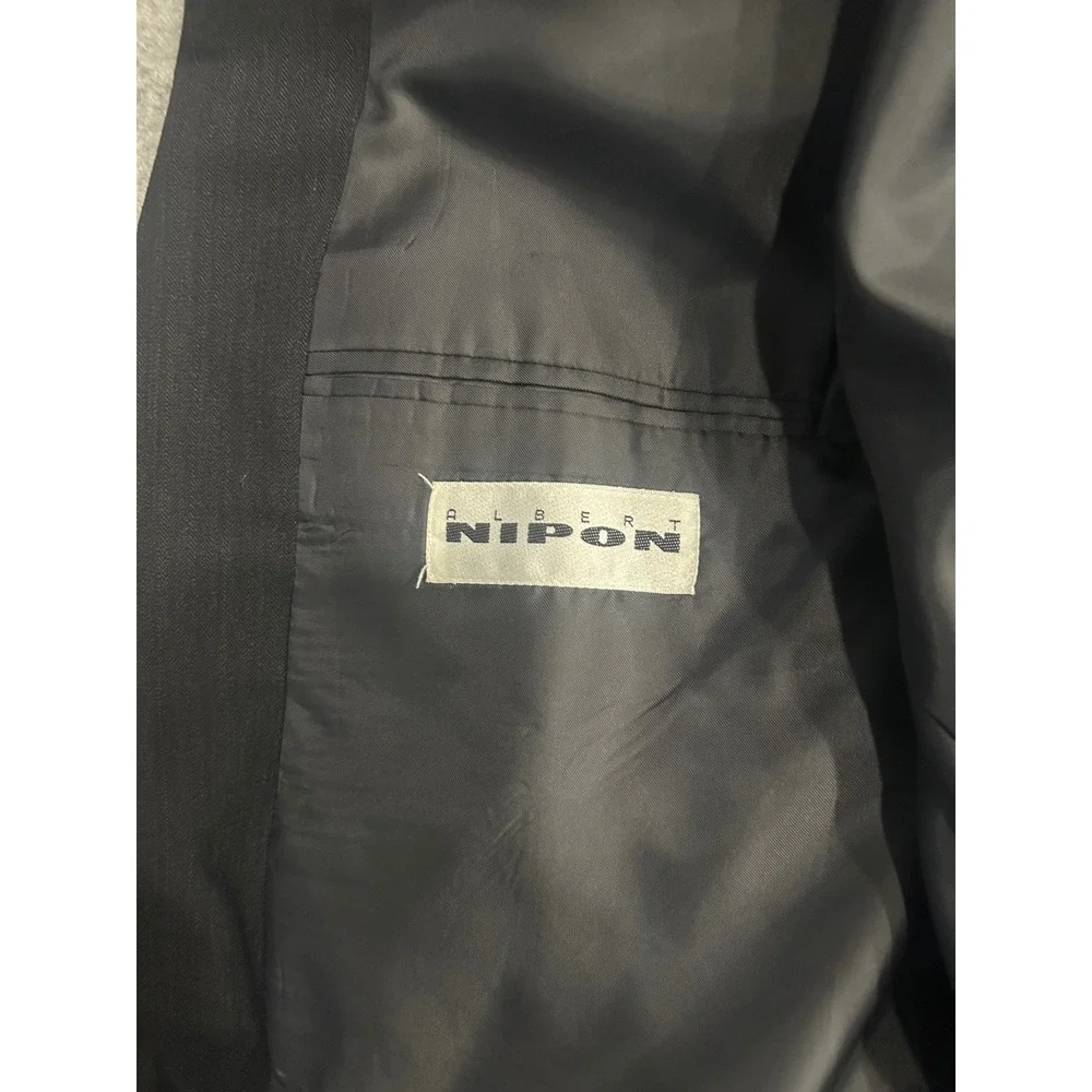 Albert Nipon Double Breasted Suit Charcoal 2 Piece Set. Golden twist, 100% wool.